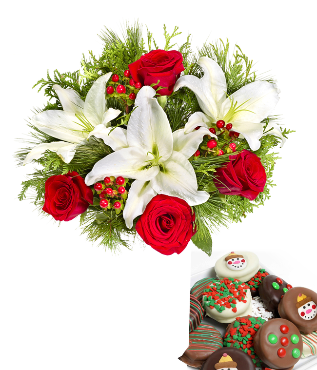 Partial image of Bouquet of red roses, white lilies, red berries, and  seasonal greens, in a clear vase with one dozen chocolate dipped oreos with candy and snowman toppings without vase.