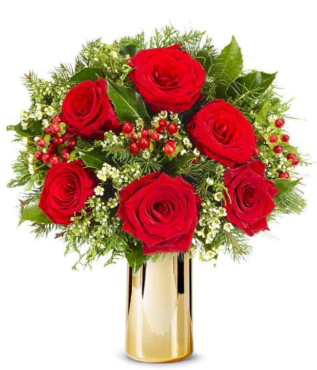 Red roses with red hypericum berries