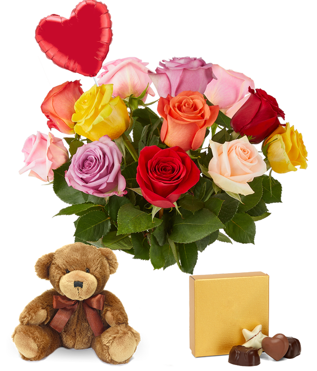 Partial image of Dozen roses red, orange, yellow, cream, pink, and lavender blooms with leaves in a clear vase. Sat next to it is a brown bear and a gold square box of chocolates with a red heart shaped balloon. without vase.