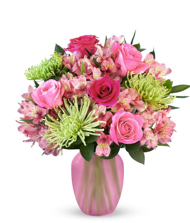 A bouquet featuring pink roses, hot pink roses, green Fuji mums, and pink alstroemeria, with an optional glass vase.