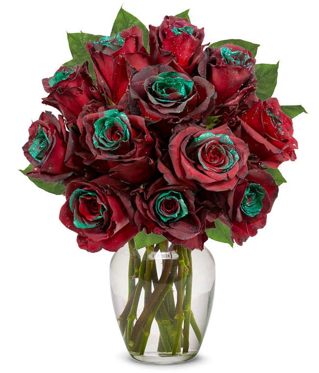 One dozen roses featuring naturally dyed red &amp; green with glitter tips, presented beautifully in an optional glass vase.