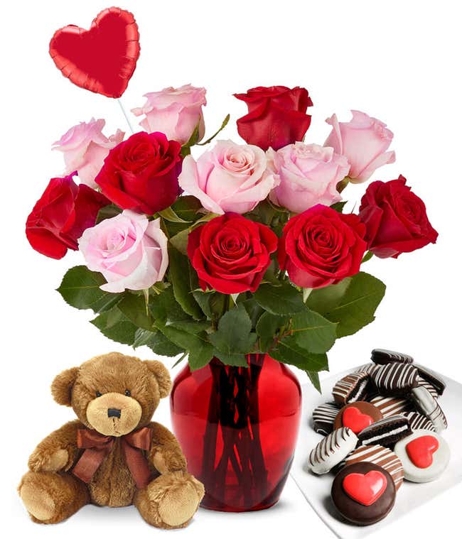 One Dozen Red &amp; Pink Roses in a clear glass vase with red heart mylar balloon, chocolate covered valentine oreos, and a teddy bear