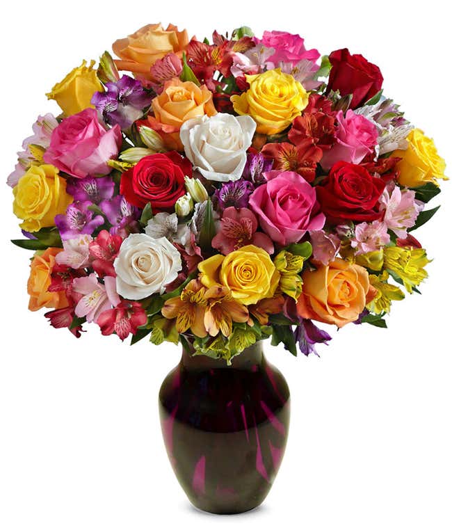 A bouquet featuring mixed roses and alstroemerias, with an optional vase.