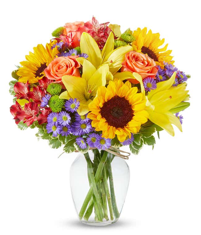 Sunflowers, yellow lilies and red alstroemeria