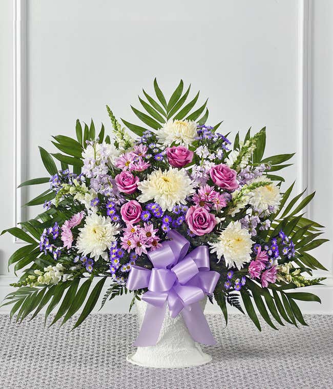 Purple and white flower sympathy basket
