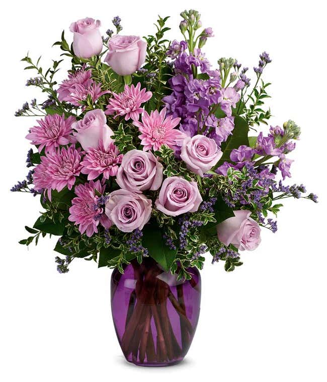 All purple arrangement with purple roses and purple mums