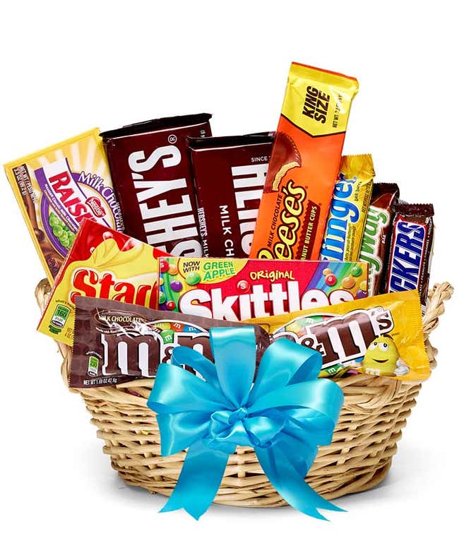 Gift Basket with a variety of candy and chocolate bars with a blue ribbon