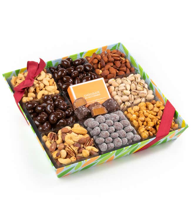 A colorful gift tray featuring an assortment of nuts and chocolates, including roasted salted cashews, pistachios, mixed nuts, almonds, butter toffee peanuts, dark chocolate almonds, chocolate toffee dusted almonds, and four sea salt caramels.