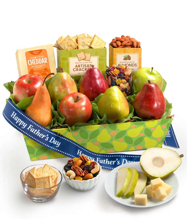 Fathers Day fruit and snack gift box featuring fresh pears and apples, cheddar cheese, artisan crackers, roasted almonds, and a dried fruit and nut mix, decorated with a blue Happy Fathers Day ribbon.