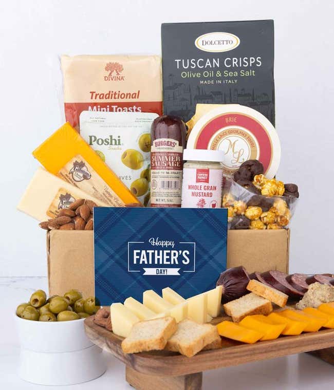 A gourmet gift with Tuscan crisps, focaccia crackers, brie, mustard, sausage, cheeses, olives, almonds, chocolate-covered treats, complete with a 'Happy Father's Day' card.