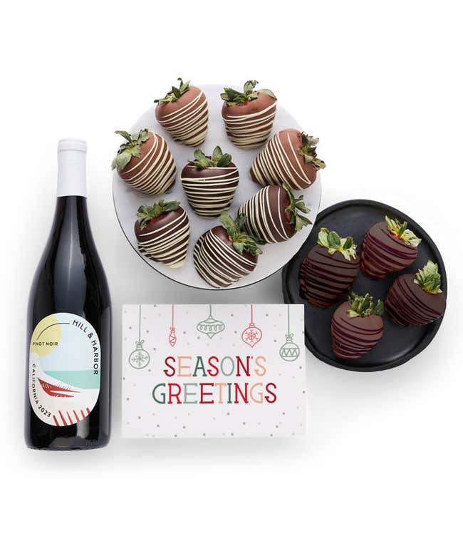 One dozen chocolate covered strawberries and a bottle of Hill and Harbor Pinot Noir with a Season's Greetings Card