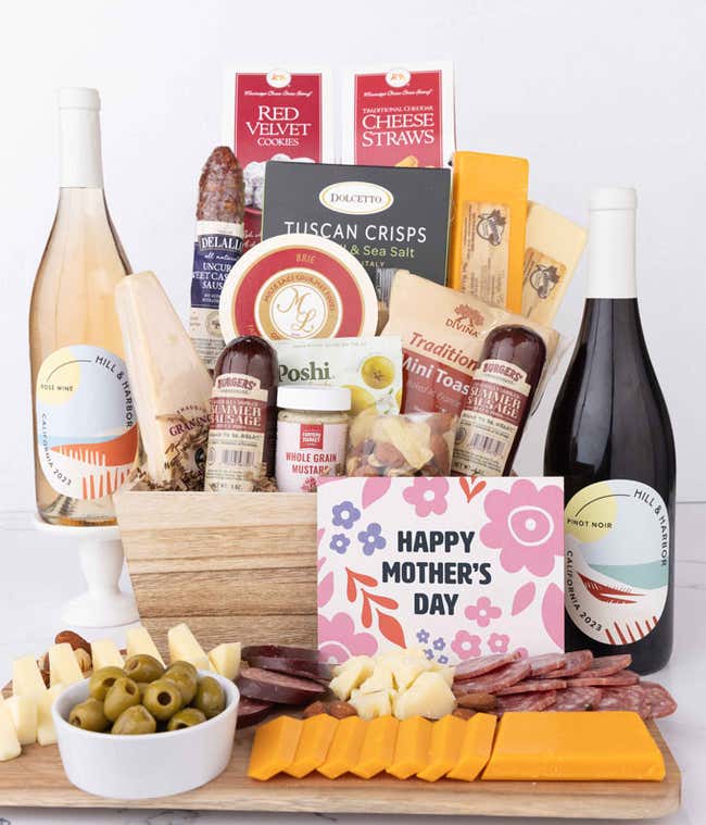Mother&rsquo;s Day charcuterie crate with Hill &amp; Harbor Ros&eacute; and Pinot Noir, artisan salami and sausage, cheeses, olives, Tuscan crisps, cookies, and savory snacks, arranged with sliced meats, cheeses, and floral card.